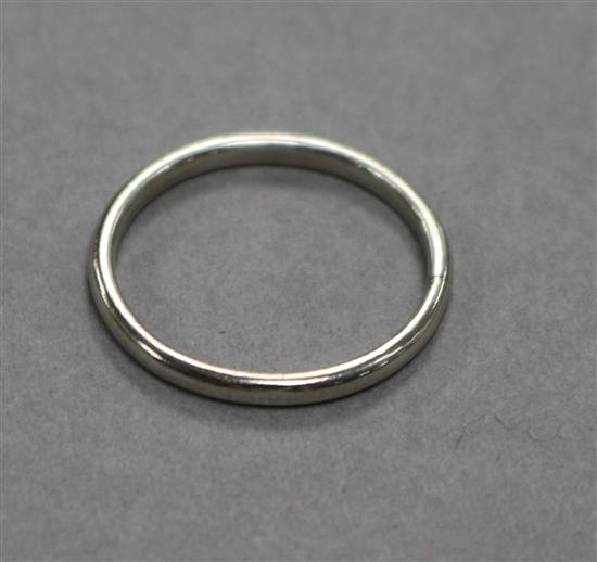 A platinum wedding band, size R.